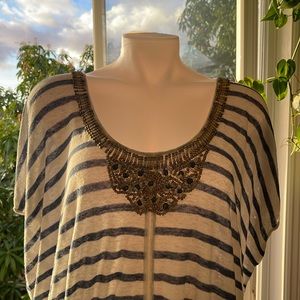 Beach coverup with beaded detailing